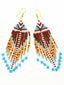 Boucles d'oreilles artisanales Marron, Orange & Blanc Taille M. Tradition Colombie. Zoom haut
