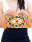 Pochette à main brodée Motif Oeil Rouge Jaune et Bleu - Artisanat Wayuu