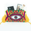 Pochette Soleico Clutch Wayuu avec Motif Oeil brodé Mauve Vert. Fait main motif Evil Eye. Artisanat Ethnique Responsable. Modèle similaire Enayim design Sac Colombien
