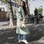Soleico sac colombien bandoulère Sac iconique Wayuu Beige & blanc Bohème chic Modèle profil rue